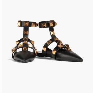 Valentino Garavani Black Leather Rockstud Pointed Flats with Gold Studs.